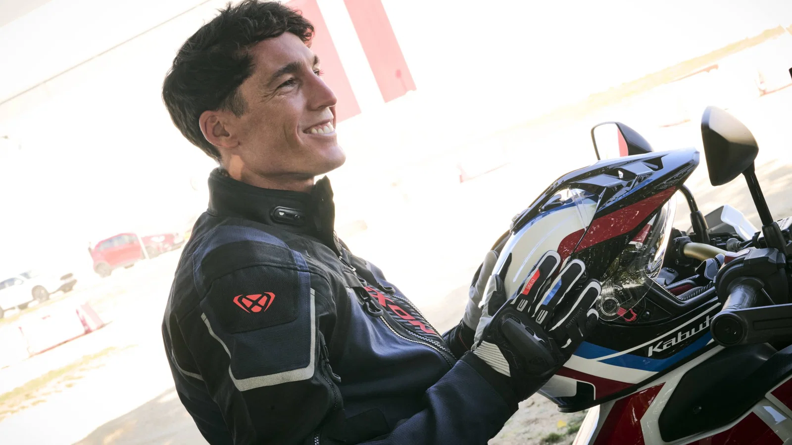 Aleix Espargaro wearing a new Honda x Ixon jacket.