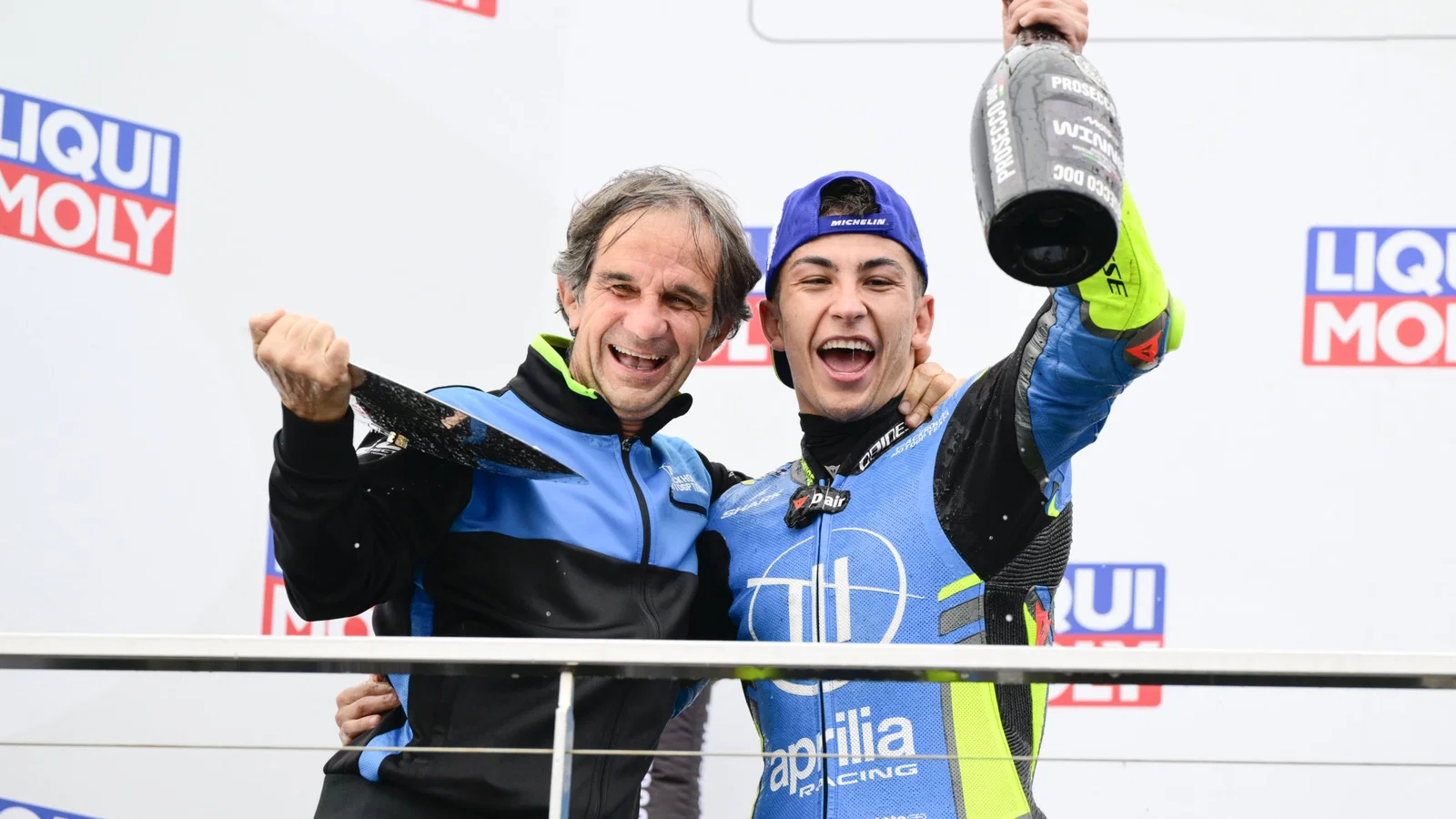 Davide Brivio celebrating a win with Raul Fernandez. Credit: Gold and Goose.