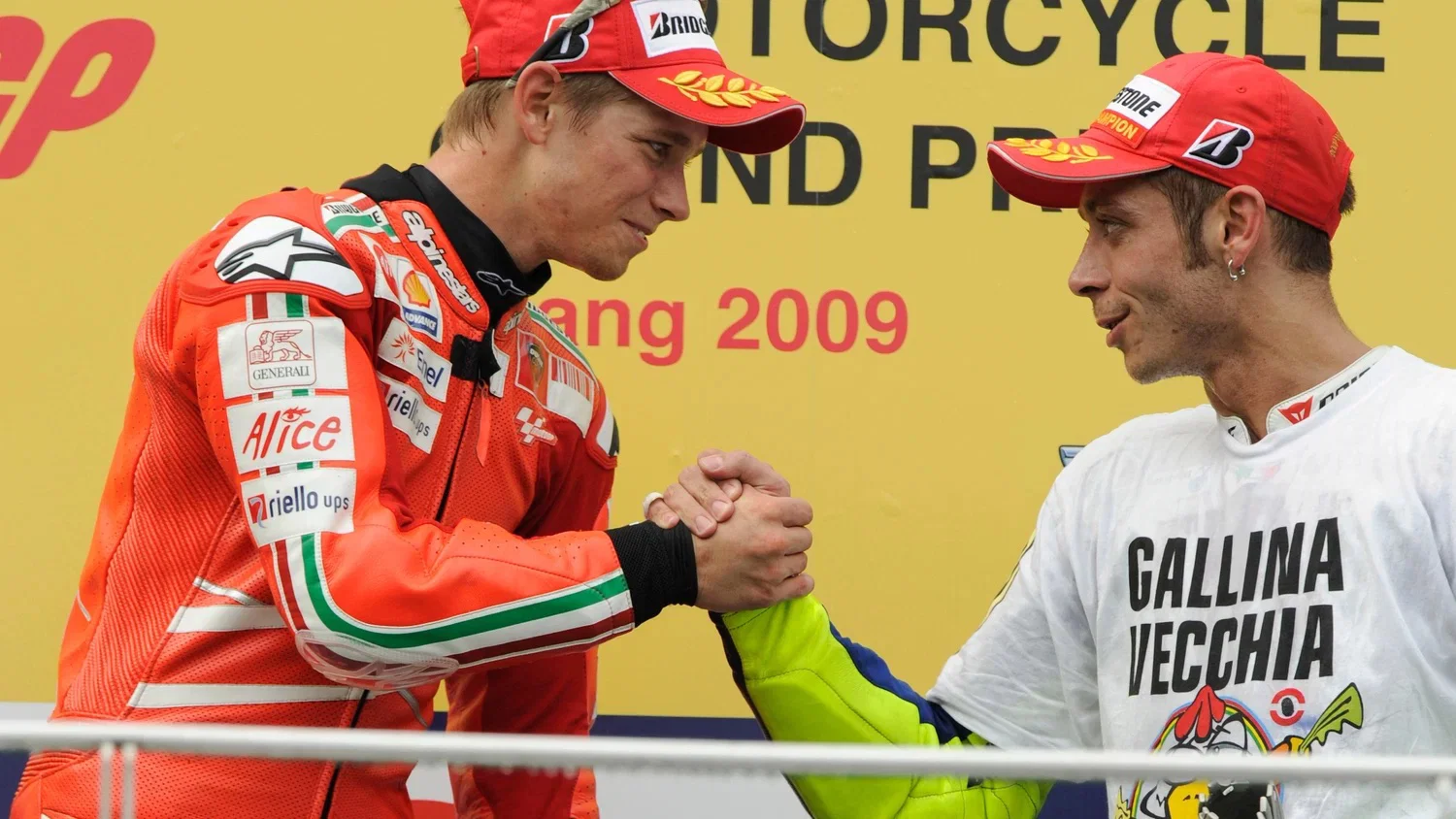Stoner et Rossi sur le podium