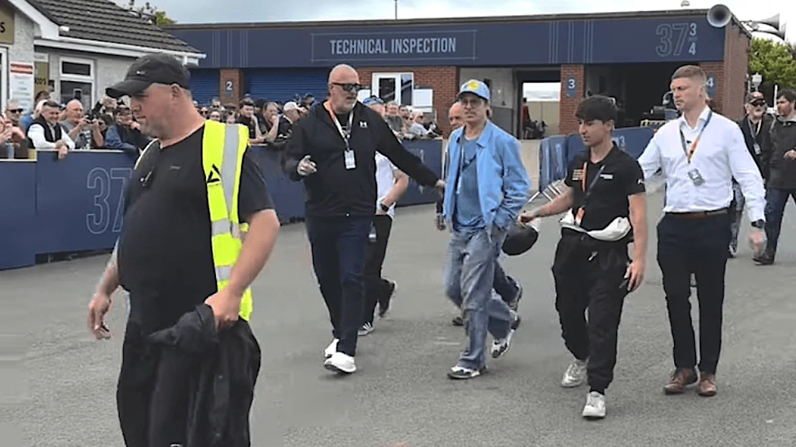 Brad Pitt in the paddock at the Isle of Man TT