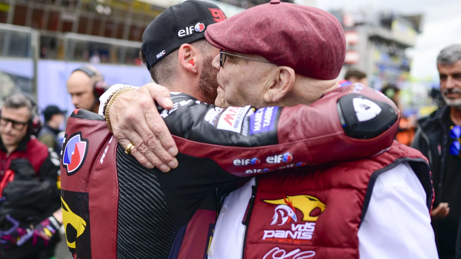Marc van der Straten with Jake Dixon ahead of a Moto2 race. Credit: Gold and Goose.