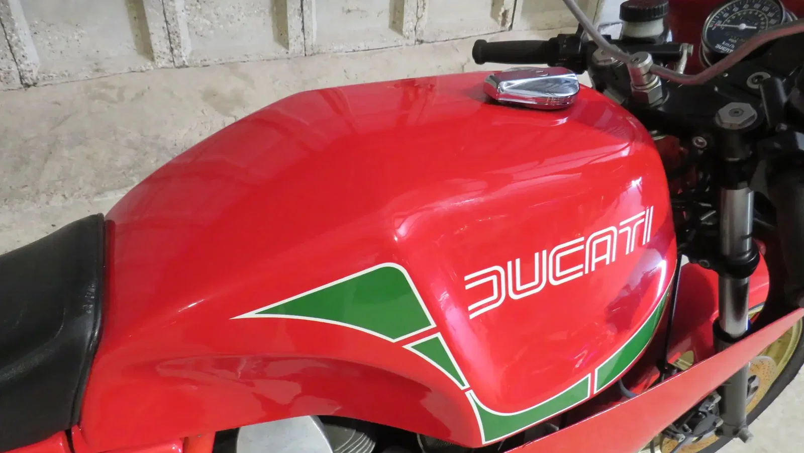 the fuel tank of a Ducati Mike Hailwood Replica